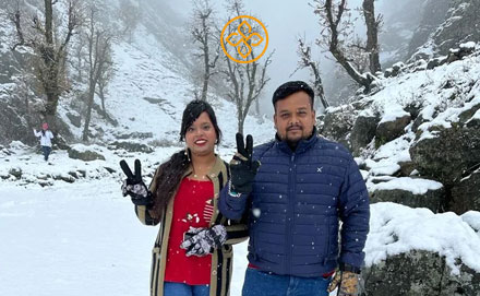 Couple enjoying a mountain-view honeymoon stay in Manali