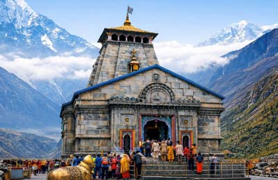 Kedarnath temple with snow-capped Himalayan peaks in the background